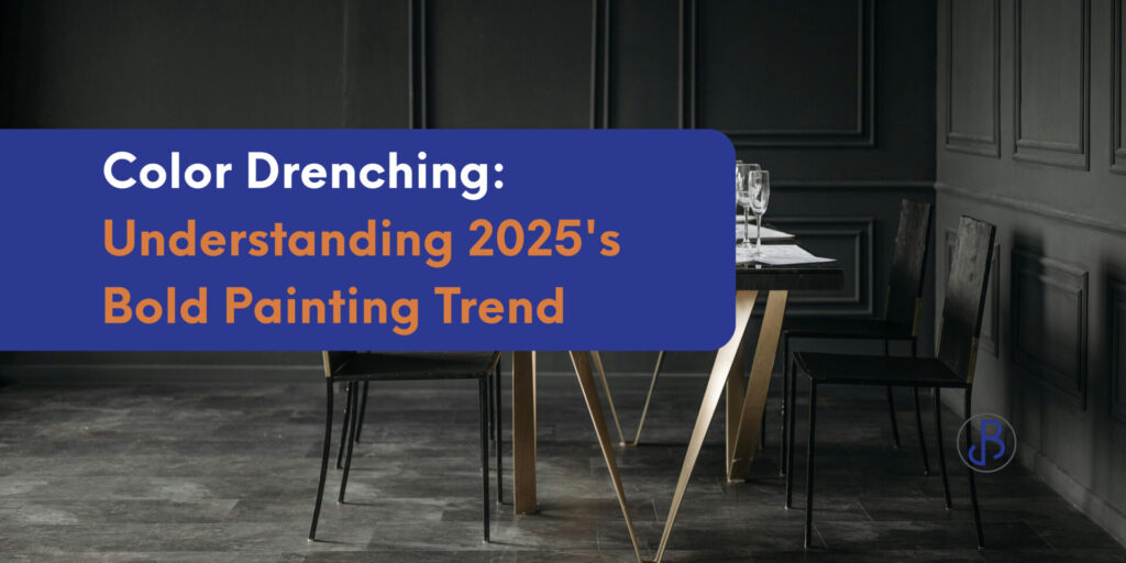 A modern dining area features a dark-painted table and chairs, wine bottles, and glassware, with text overlay highlighting the 2025 Color Drenching painting trend.
